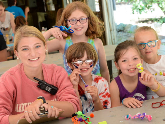 arts and crafts with kids and counselor