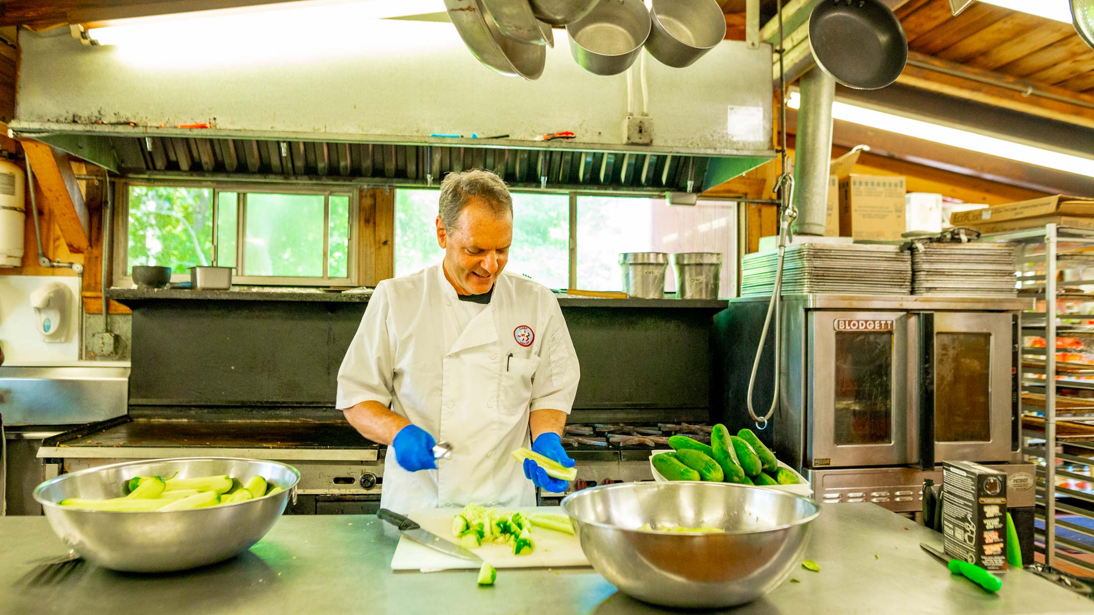 Chef T chopping vegetables