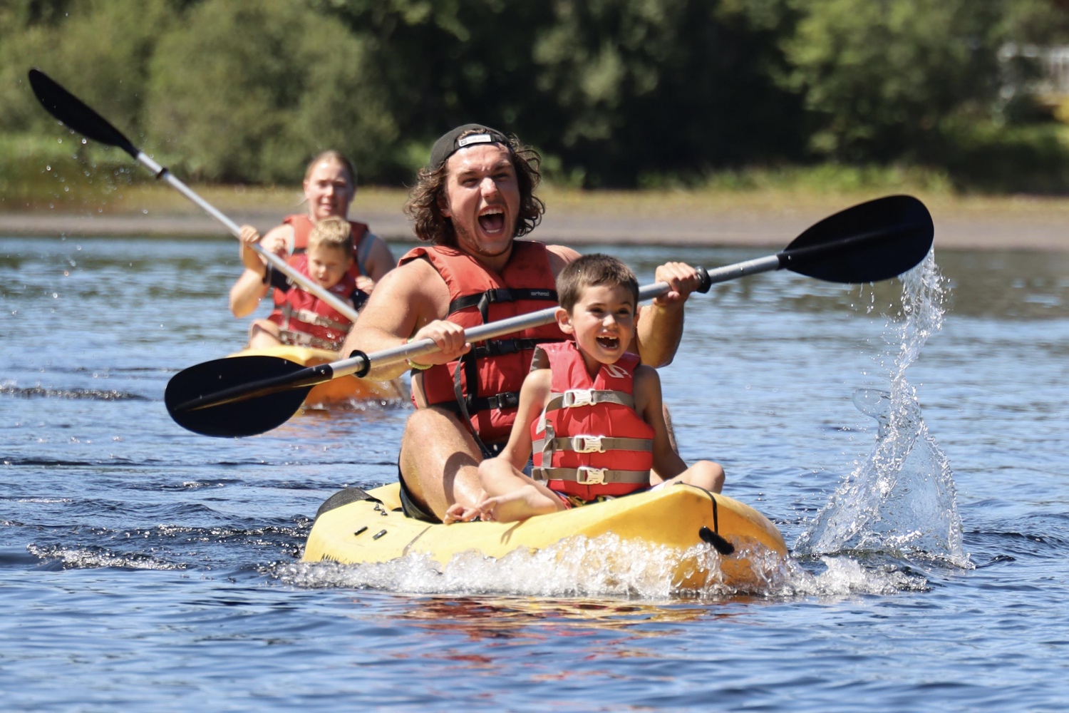 Camper and counselor on kayak